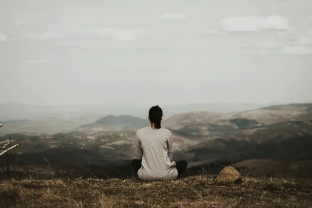 Woman on cliff