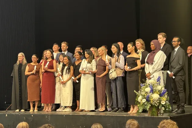 students on a stage